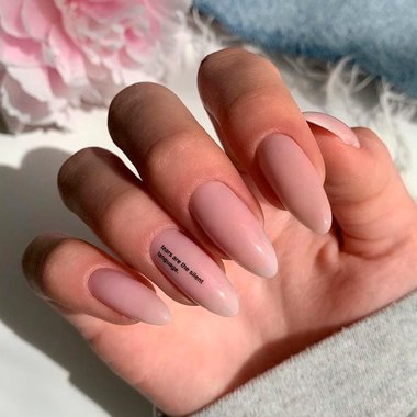 Manicure with inscriptions (Nude design)