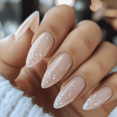 Almond manicure with glitter