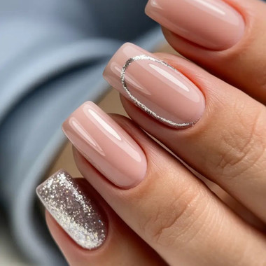 Nude manicure with shiny accents