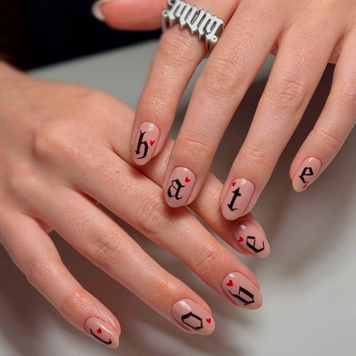 Manicure with inscriptions (Single letters)