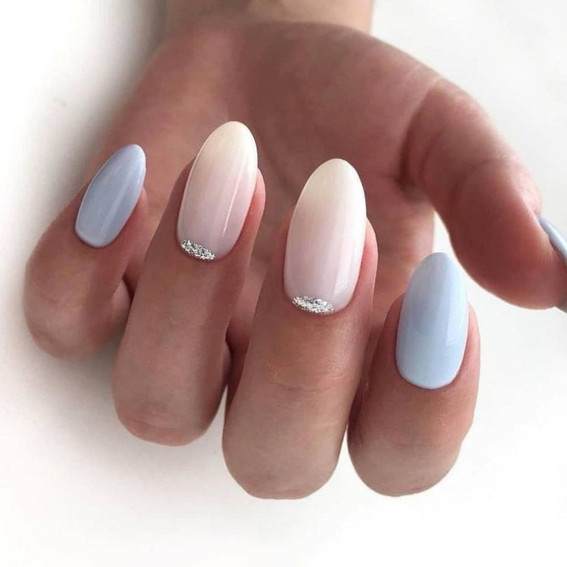Pastel manicure with glitter