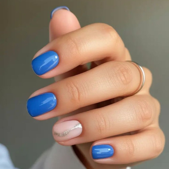 Blue manicure with silver wave