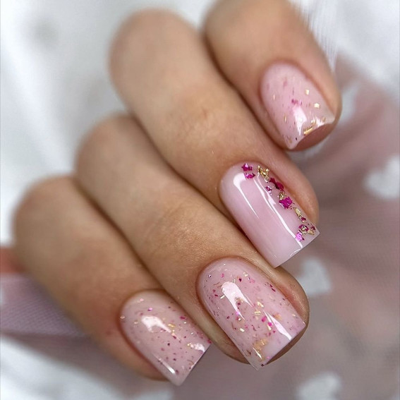 Delicate pink manicure with foil and glitter